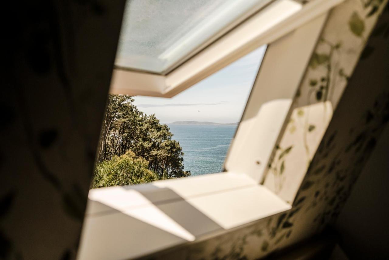 Hotel Piramide Portonovo Buitenkant foto